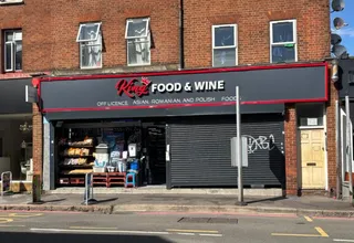Reading shop faces licence axe after knives found behind counter